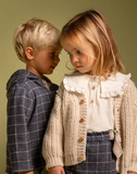 Blusa con colletto arricciato