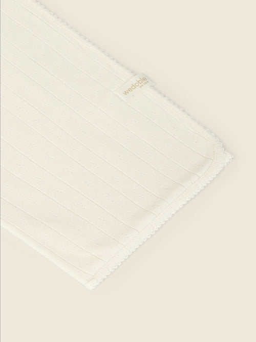 Copertina culla in cotone leggero traforata